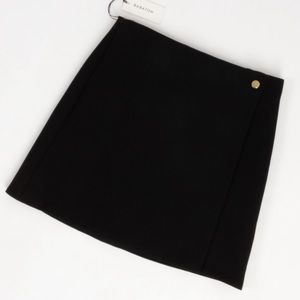 Aritzia Babaton Wayne wrap style miniskirt with button detail in size 2 (black)